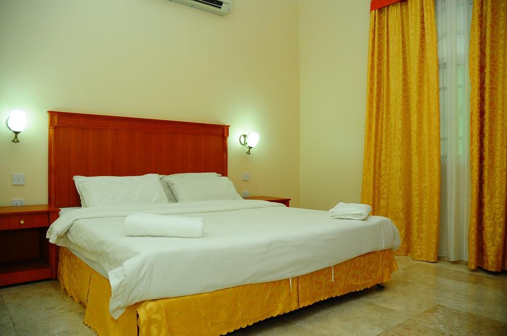 Al Faisal Hotel Suites Szúr Szoba fotó