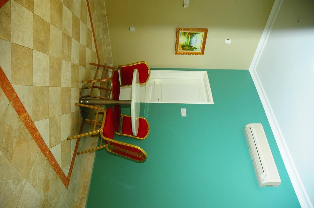 Al Faisal Hotel Suites Szúr Szoba fotó